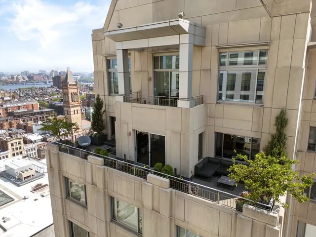 an aerial view of a balcony with city view