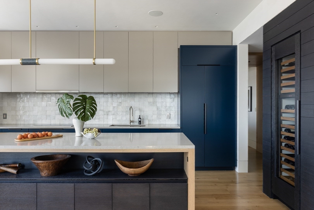 1 Huntington Avenue, Unit 1702 Boston, MA 02116 - Photo 6 of 42 a kitchen with a stove and a refrigerator