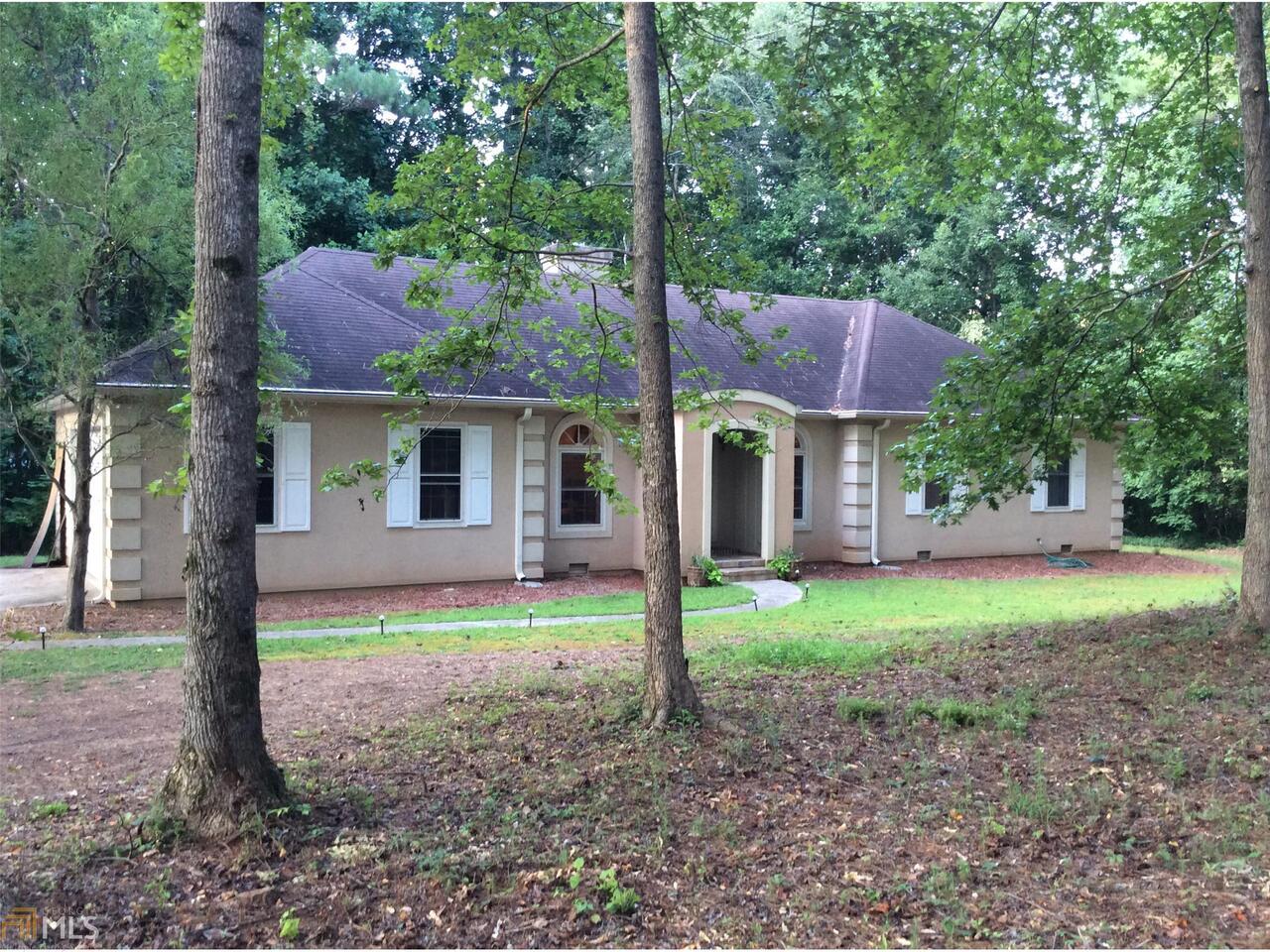 864 Old Pendergrass Road Jefferson, GA 30549 - Photo 1 of 1 a front view of a house with garden