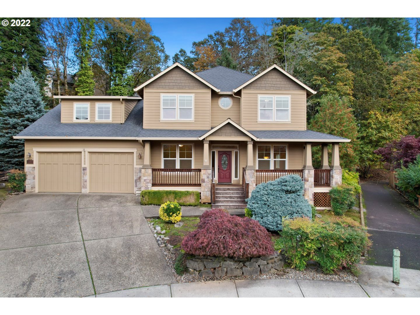 3237 Ridge Pointe Drive Forest Grove, OR 97116 - Photo 1 of 32 a front view of a house with a yard and garage