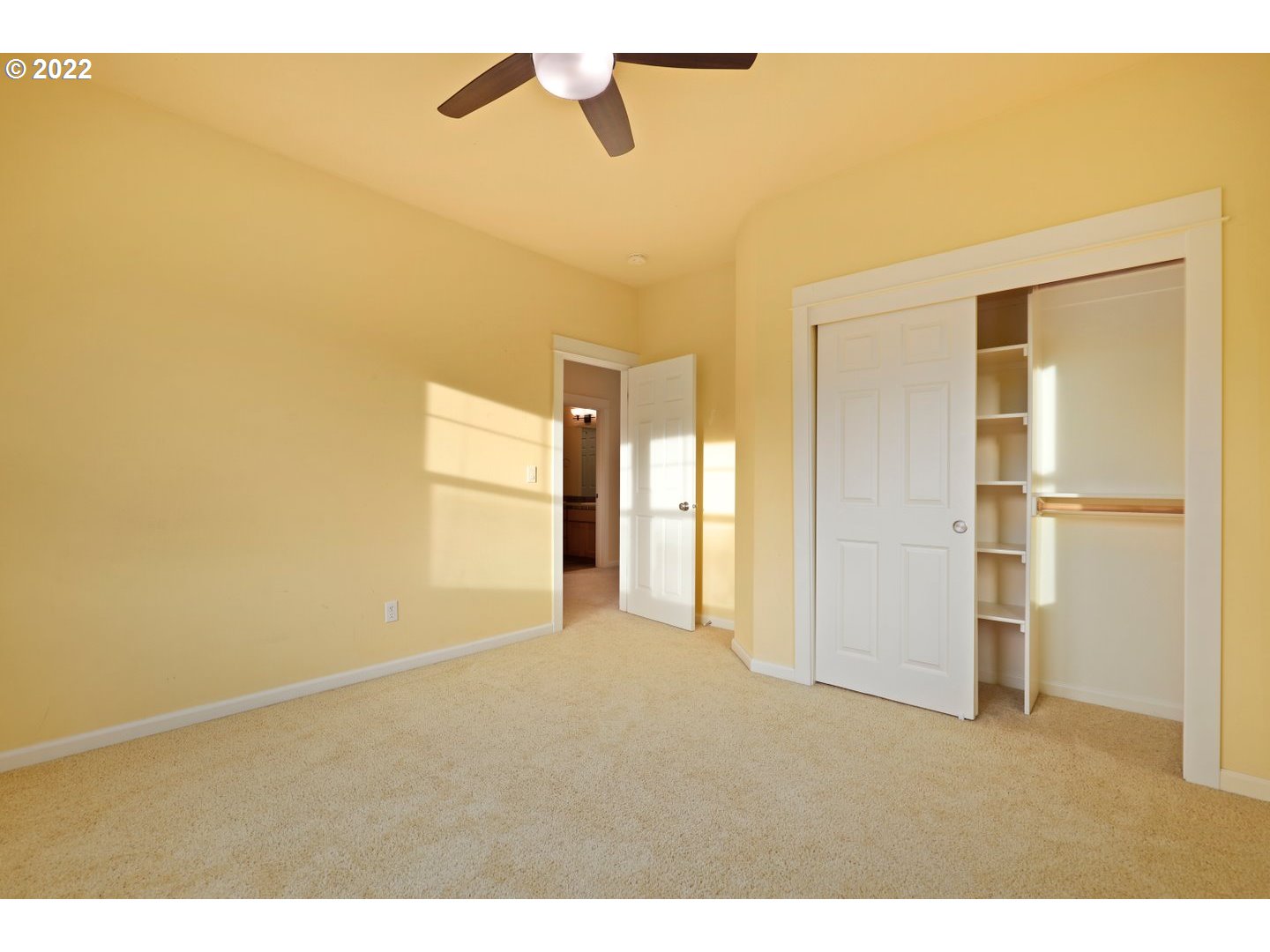 3237 Ridge Pointe Drive Forest Grove, OR 97116 - Photo 24 of 32 a view of empty room with wooden floor and cabinet