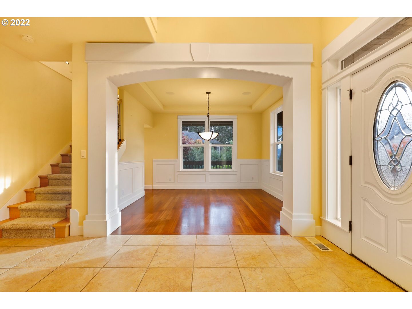 3237 Ridge Pointe Drive Forest Grove, OR 97116 - Photo 4 of 32 a view of a hallway with wooden floor and furniture