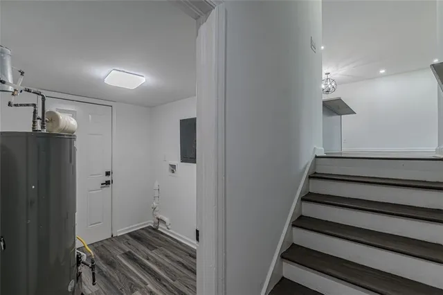 a view of a hallway with staircase