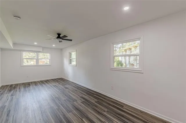 an empty room with windows