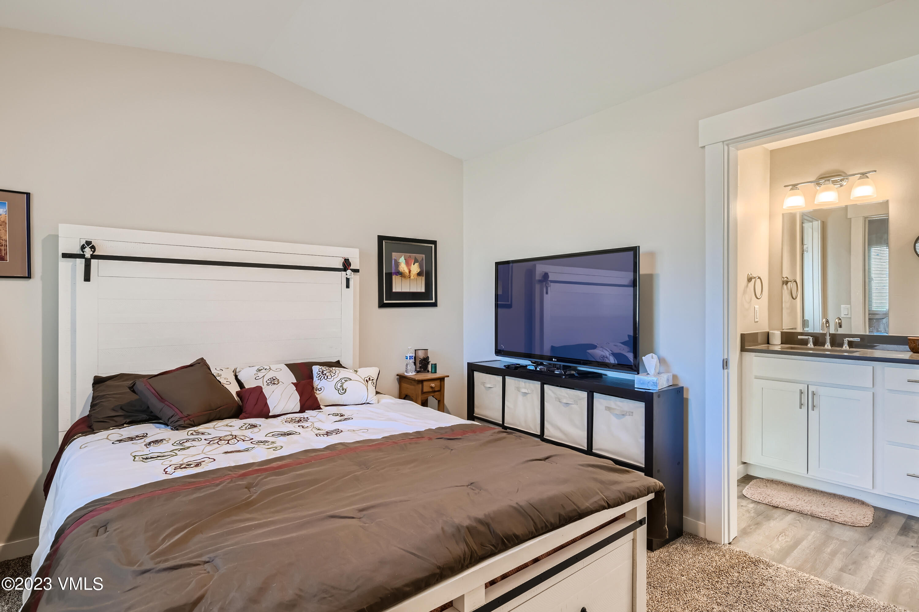 604 Chickadee Lane Gypsum, CO 81637 - Photo 5 of 11 a bedroom with a bed and window