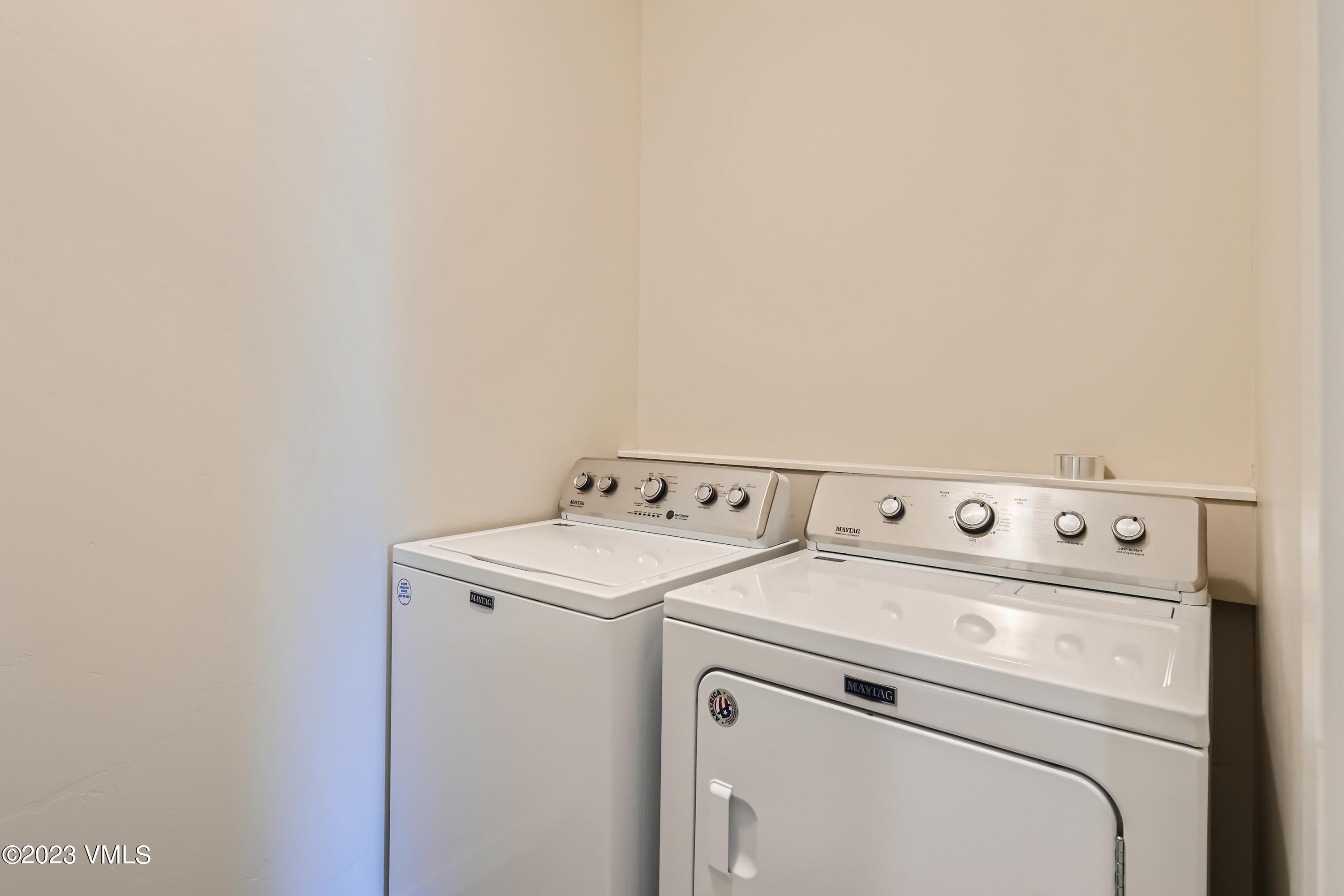 604 Chickadee Lane Gypsum, CO 81637 - Photo 10 of 11 a utility room with dryer and washer