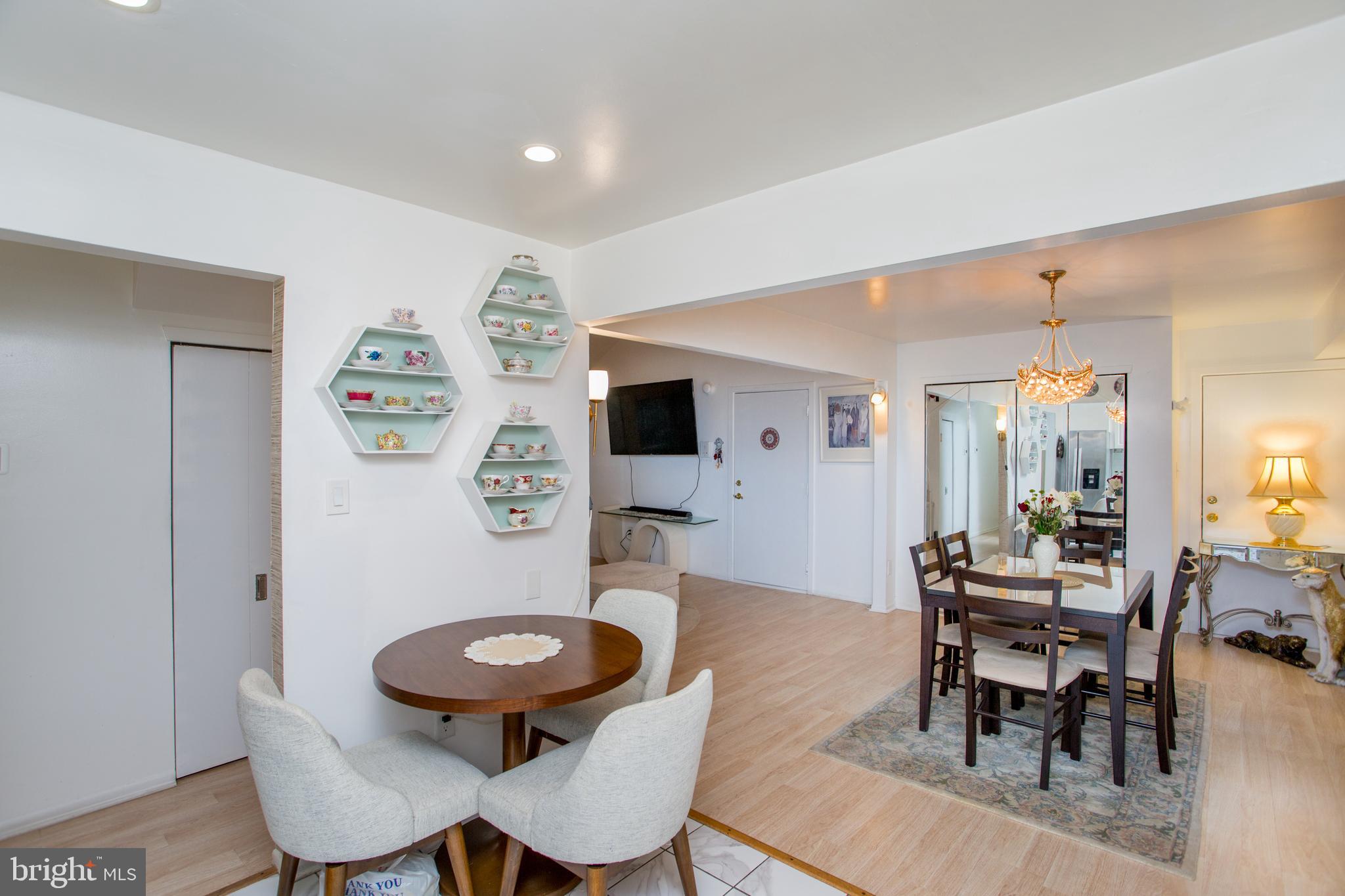 48 Bonnie Gellman Court, Unit B48 Philadelphia, PA 19114 - Photo 22 of 70 a living room with furniture and wooden floor
