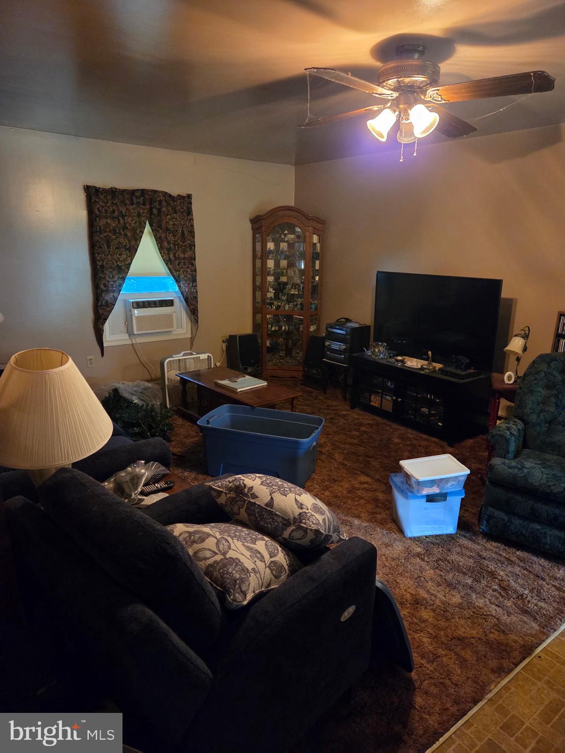 4942 Elizabethtown Road Manheim, PA 17545 - Photo 14 of 23 a living room with furniture and a flat screen tv