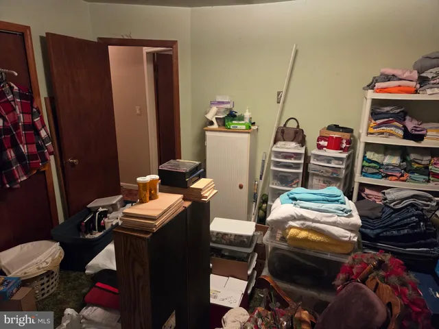 a bed room with a bed and a couch