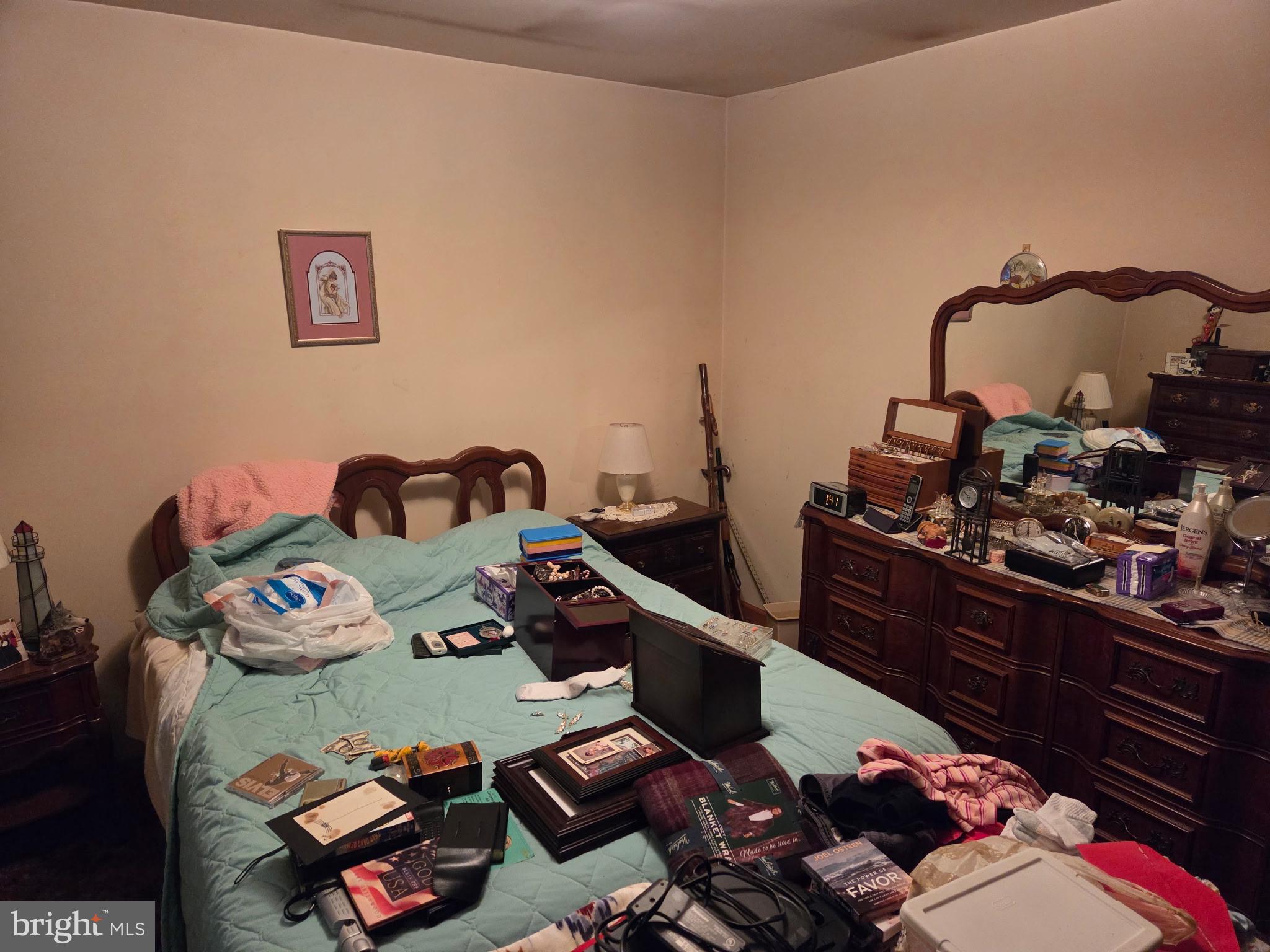 4942 Elizabethtown Road Manheim, PA 17545 - Photo 19 of 23 a bed room with a bed and a couch