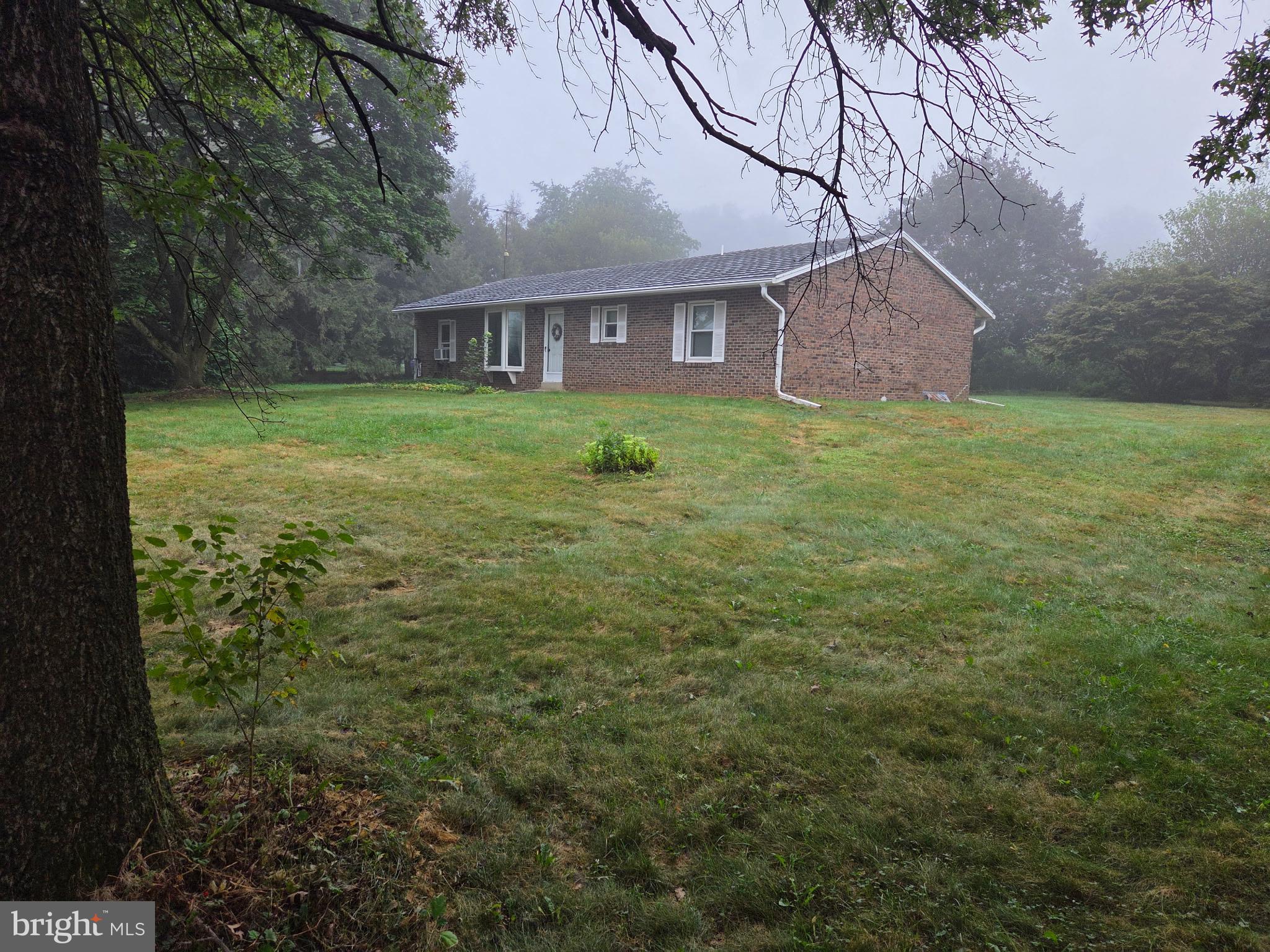 4942 Elizabethtown Road Manheim, PA 17545 - Photo 2 of 23 a view of a house with a yard