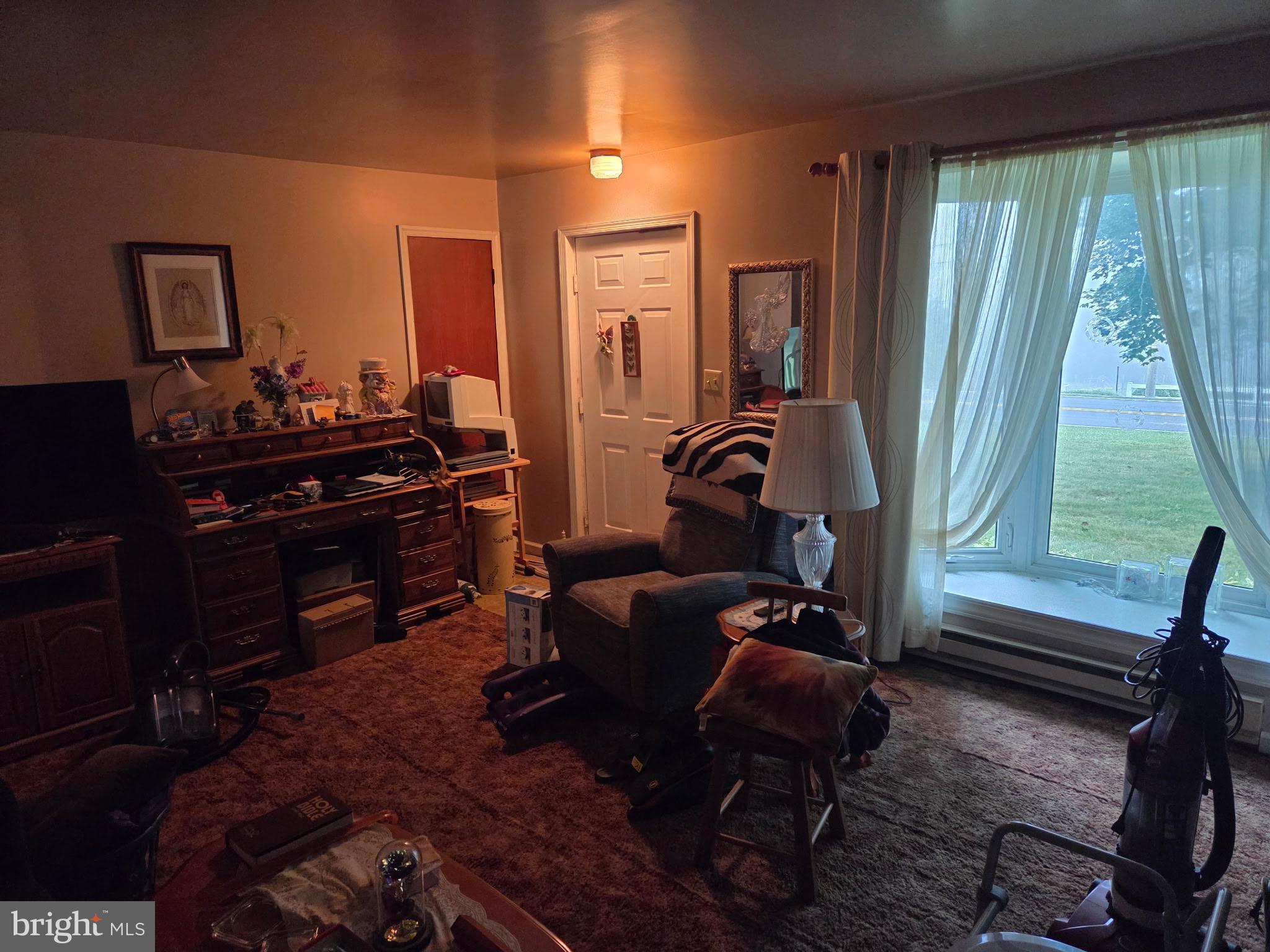 4942 Elizabethtown Road Manheim, PA 17545 - Photo 22 of 23 a room with furniture and a window