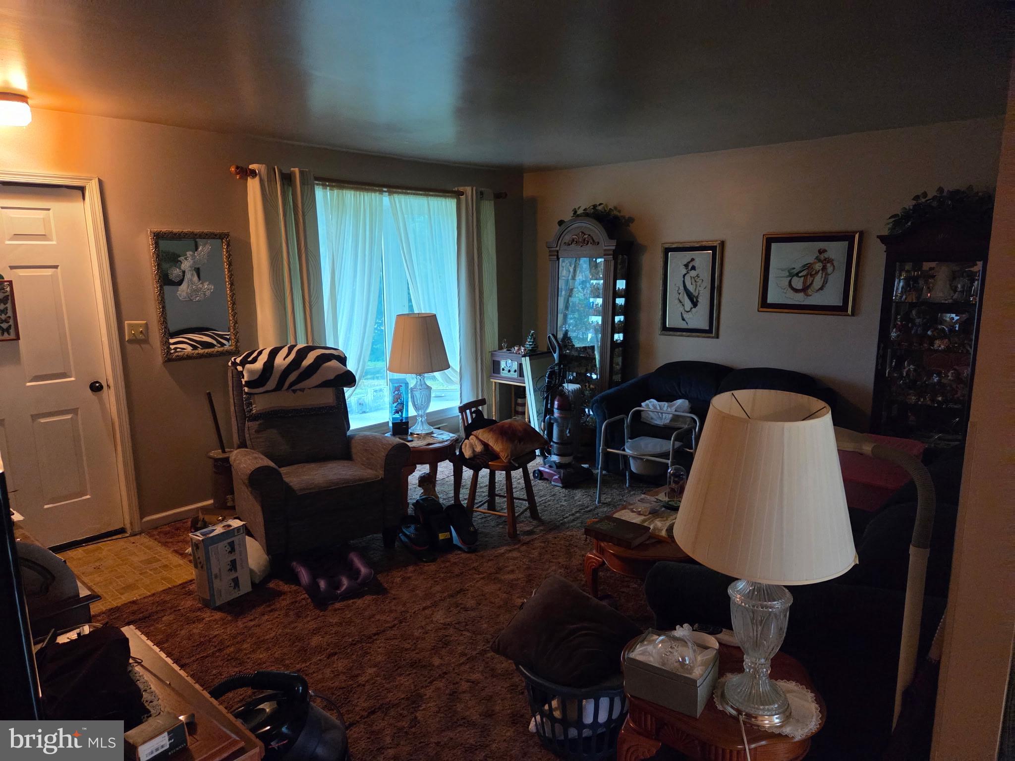 4942 Elizabethtown Road Manheim, PA 17545 - Photo 23 of 23 a living room with furniture and a window