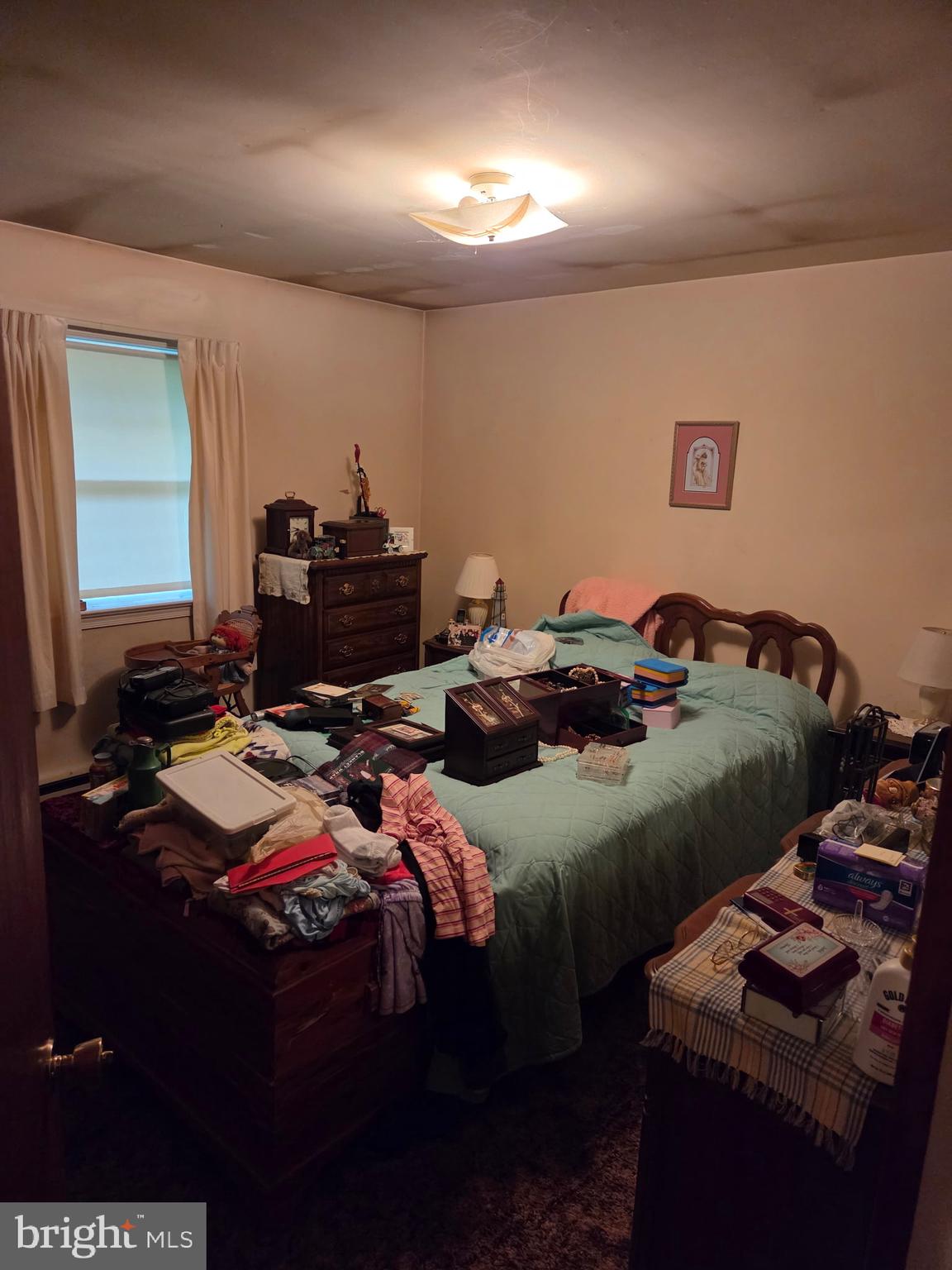 4942 Elizabethtown Road Manheim, PA 17545 - Photo 10 of 23 a bedroom with a bed and a dresser