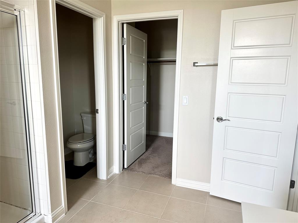 6814 East Riverside Drive, Unit 26 Austin, TX 78741 - Photo 14 of 21 Clean lines and light-colored finishes define this well-appointed bathroom space.