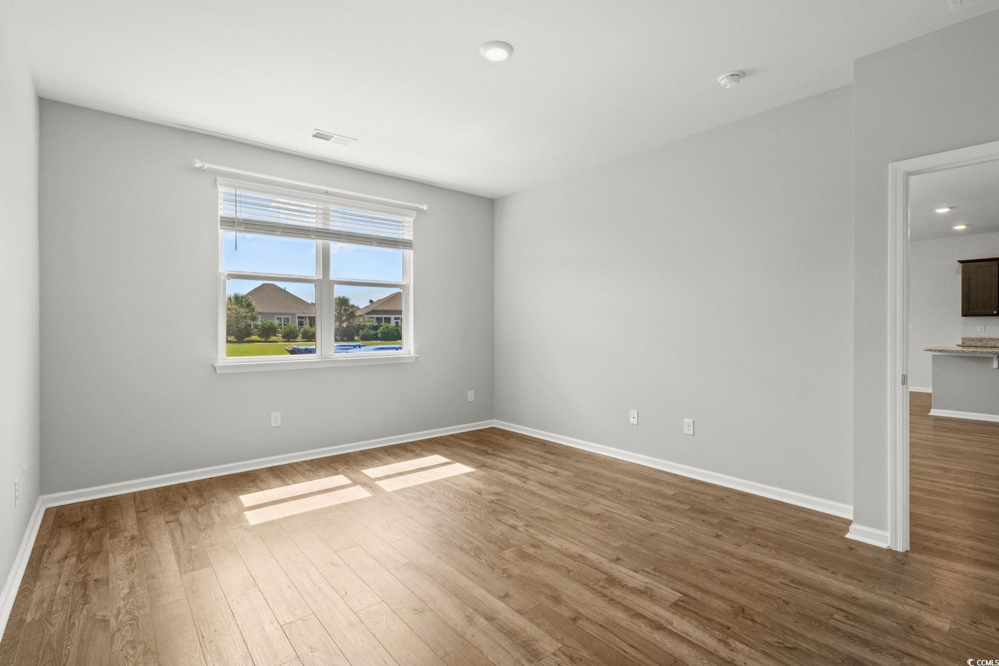 2631 Ophelia Way Myrtle Beach, SC 29577 - Photo 18 of 40 Unfurnished room with dark wood finished floors and recessed lighting