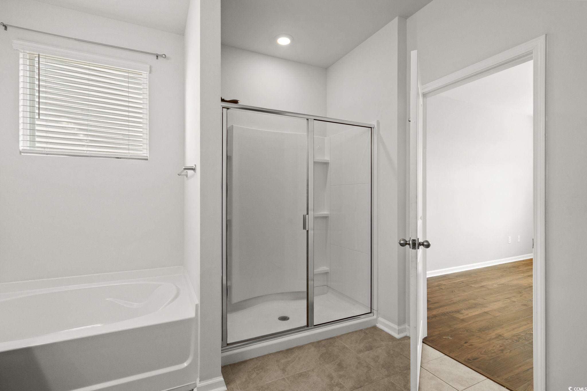 2631 Ophelia Way Myrtle Beach, SC 29577 - Photo 20 of 40 Full bath with a garden tub, a shower stall, and light tile patterned flooring