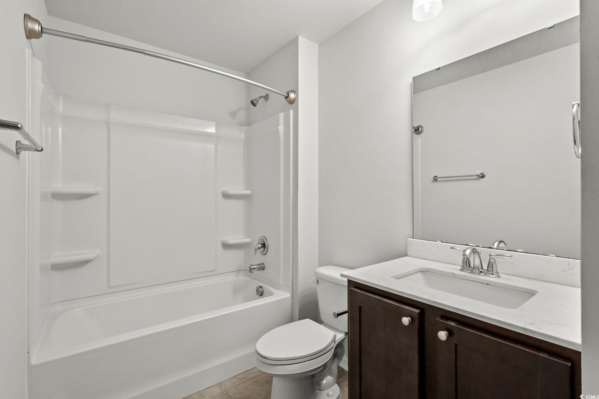 2631 Ophelia Way Myrtle Beach, SC 29577 - Photo 26 of 40 Full bathroom with shower / bathtub combination, vanity, and light tile patterned floors