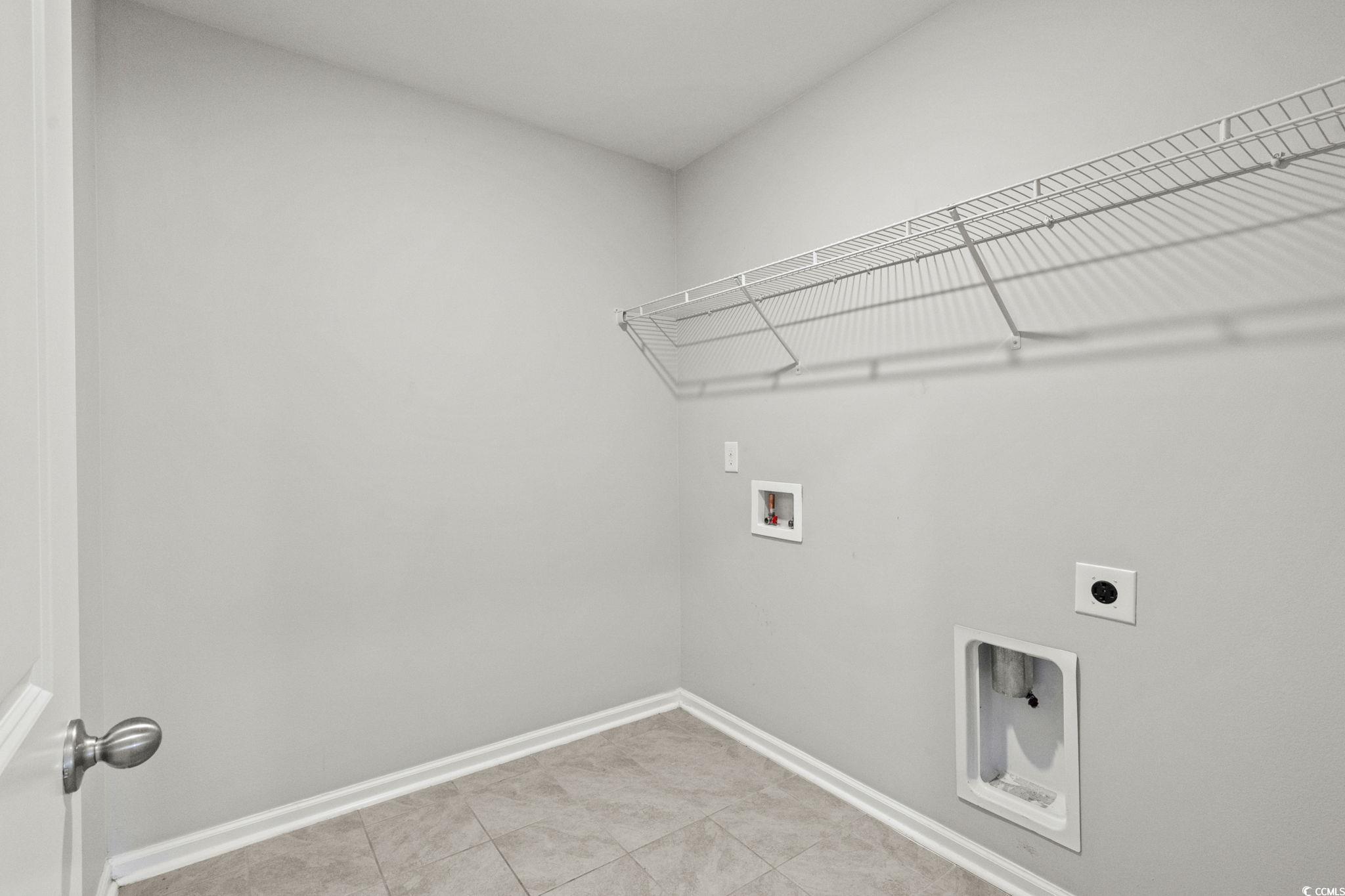 2631 Ophelia Way Myrtle Beach, SC 29577 - Photo 31 of 40 Washroom featuring hookup for a washing machine, electric dryer hookup, and light tile patterned flooring