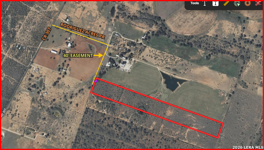 449 Rodriguez Acres Jourdanton, TX 78026 - Photo 2 of 14 a balcony with filled with outdoor seating