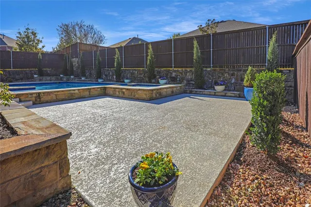 a front view of house with yard and outdoor seating