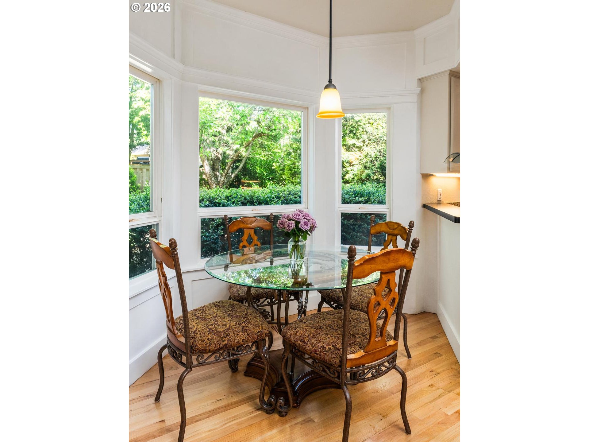 16042 Southwest Waxwing Way Beaverton, OR 97007 - Photo 11 of 48 a dining room with furniture and a floor to ceiling window