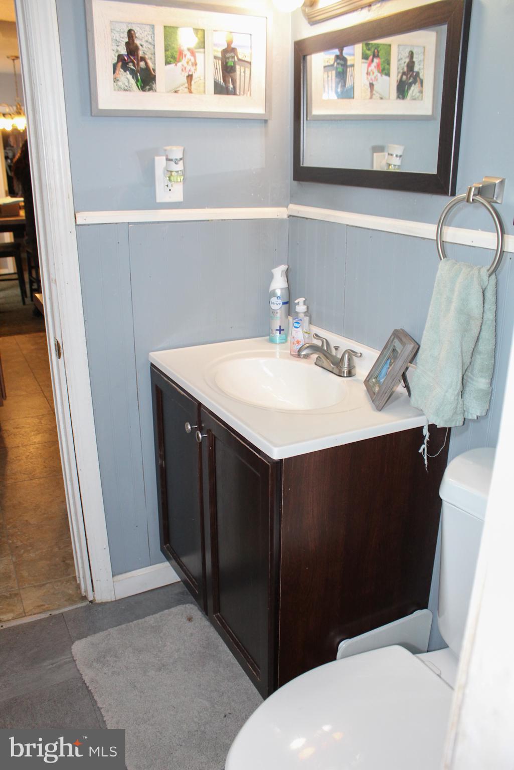 30 Sharp Avenue Bridgeton, NJ 08302 - Photo 13 of 18 a bathroom with a sink and a mirror