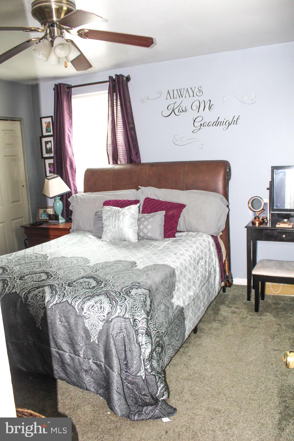 30 Sharp Avenue Bridgeton, NJ 08302 - Photo 14 of 18 a bedroom with a bed and a chandelier