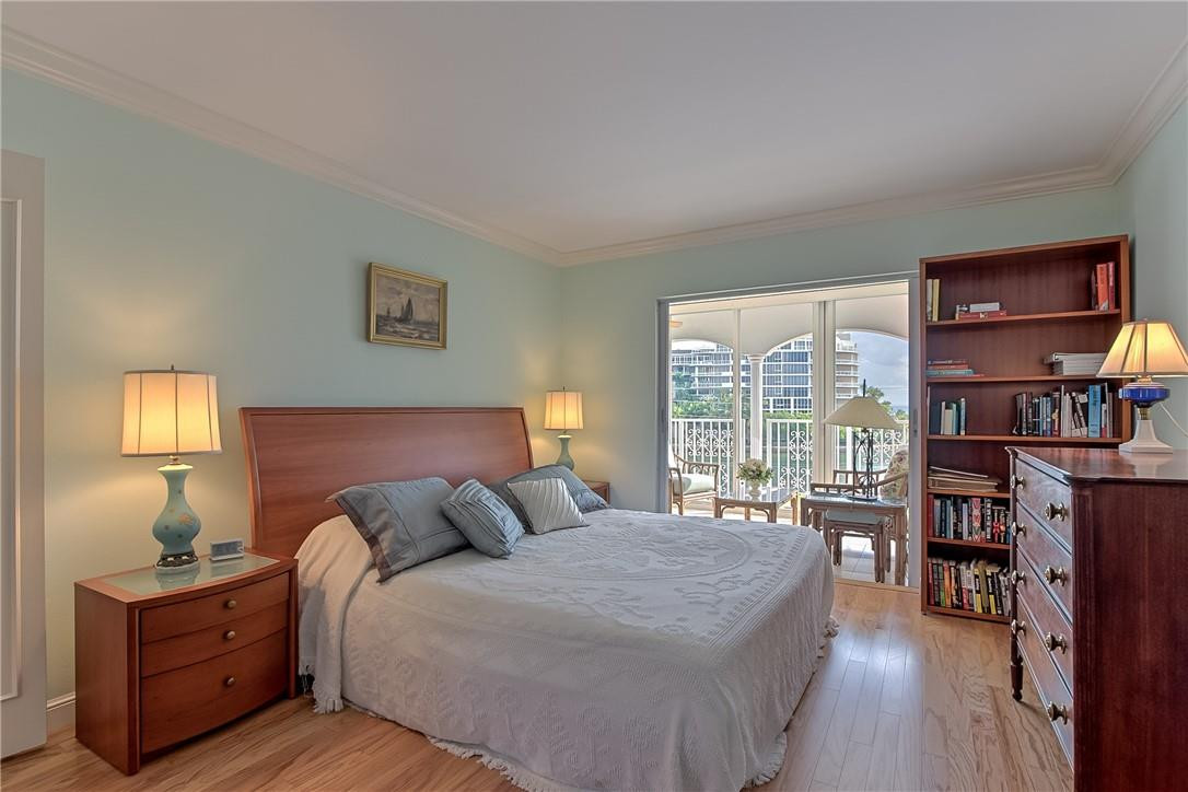 1099 South Ocean Boulevard, Unit 403 Boca Raton, FL 33432 - Photo 31 of 45 Master bedroom with sliders onto sunroom