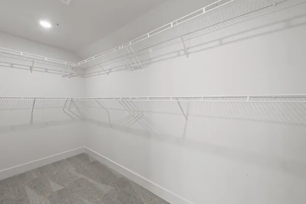a view of a room with racks on the wall