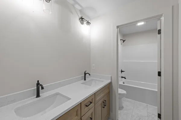 a bathroom with a sink and a vanity