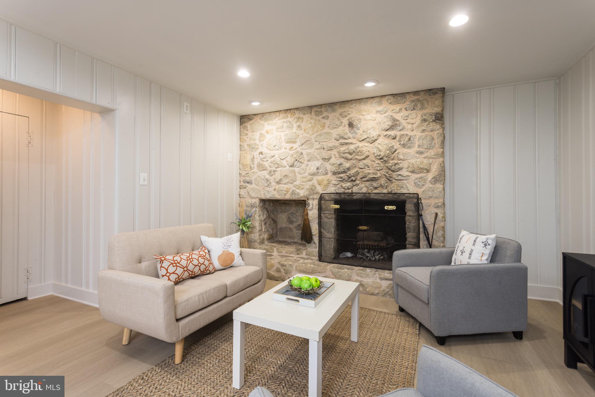 412 Aigburth Road Baltimore, MD 21286 - Photo 20 of 29 Cozy living space with stone fireplace.