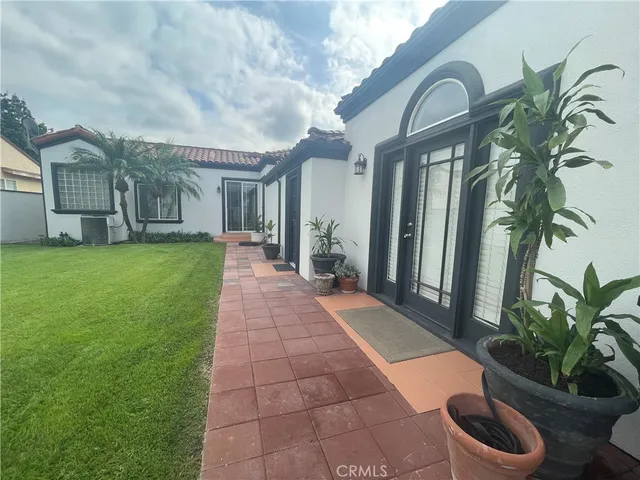 a backyard of a house with seating space