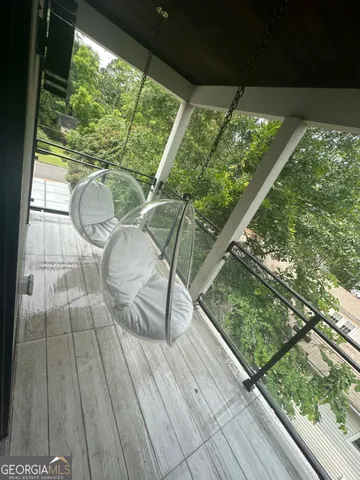 a view of fountain from a balcony