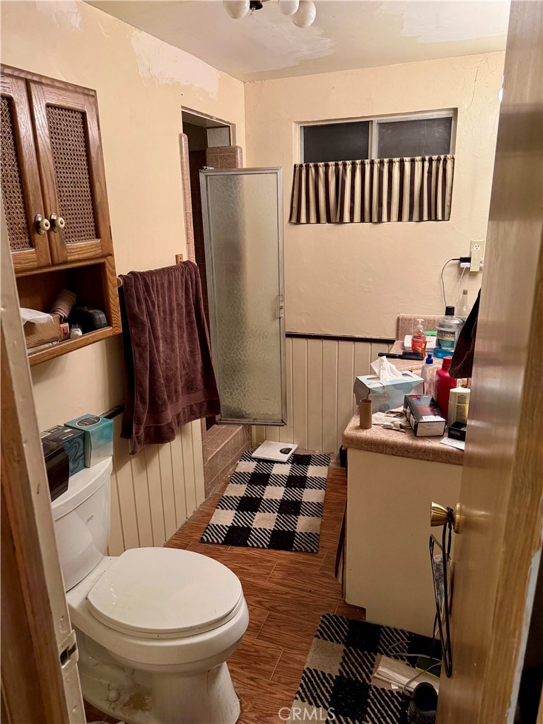31776 Panorama Road Running Springs, CA 92382 - Photo 10 of 11 a bathroom with a toilet and a mirror