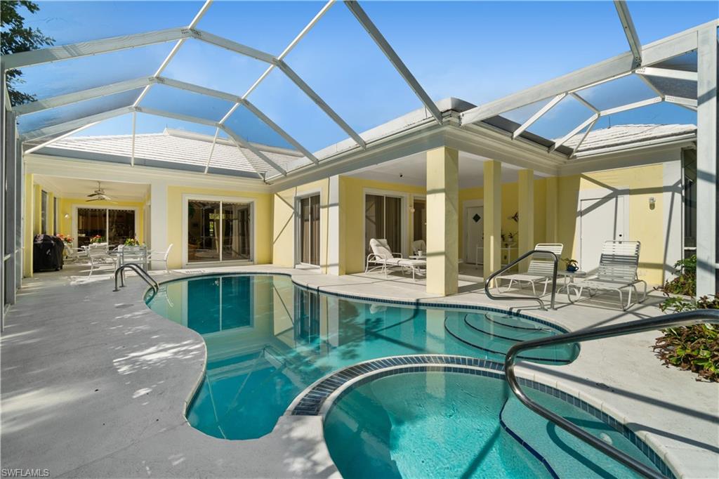 a view of swimming pool with outdoor seating