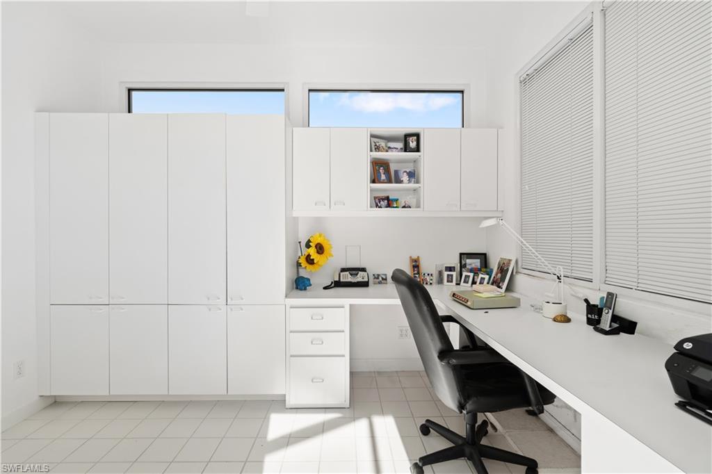 736 Ashburton Drive Naples, FL 34110 - Photo 22 of 37 a view of a workspace with furniture