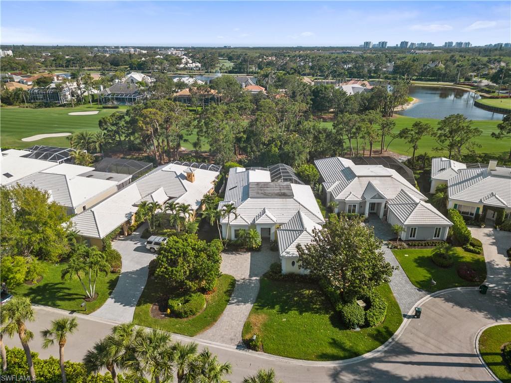 736 Ashburton Drive Naples, FL 34110 - Photo 6 of 37 an aerial view of multiple house