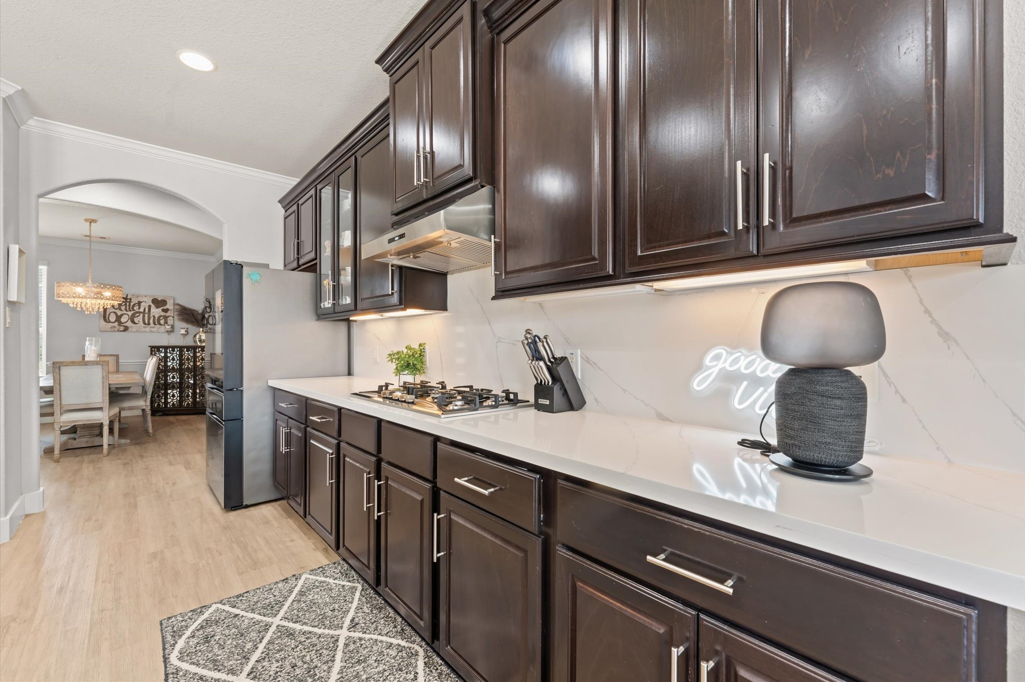 14016 Savannah Landing Lane Rosharon, TX 77583 - Photo 18 of 49 a kitchen with stainless steel appliances granite countertop a sink and cabinets