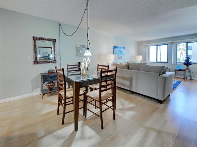 a bedroom with furniture and a book shelf