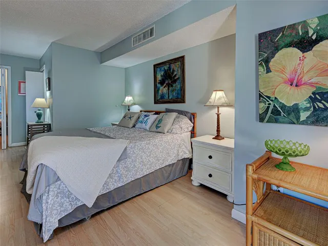 a bed room with furniture and a window