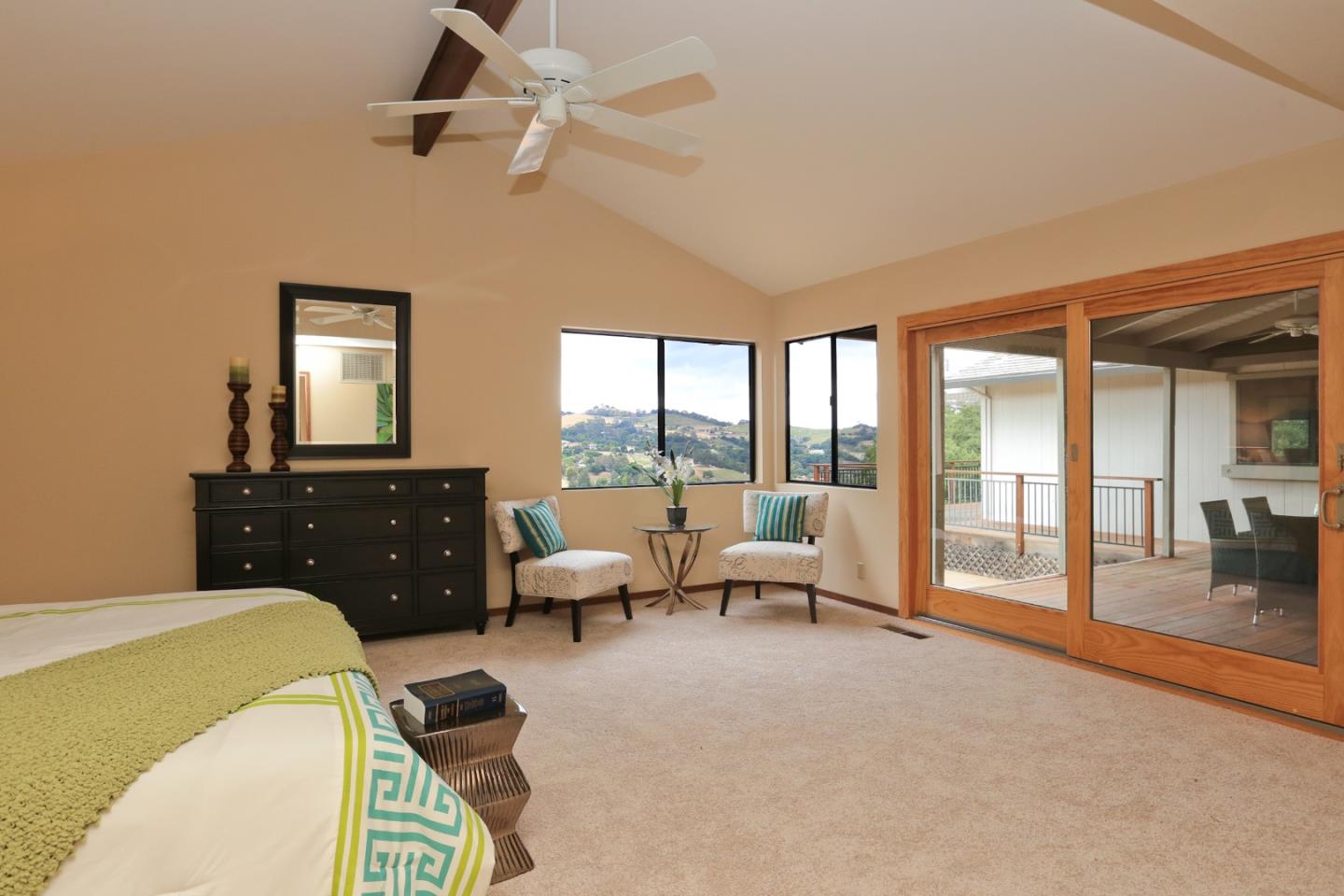 13987 Pike Road Saratoga, CA 95070 - Photo 11 of 28 a living room with furniture and a floor to ceiling window