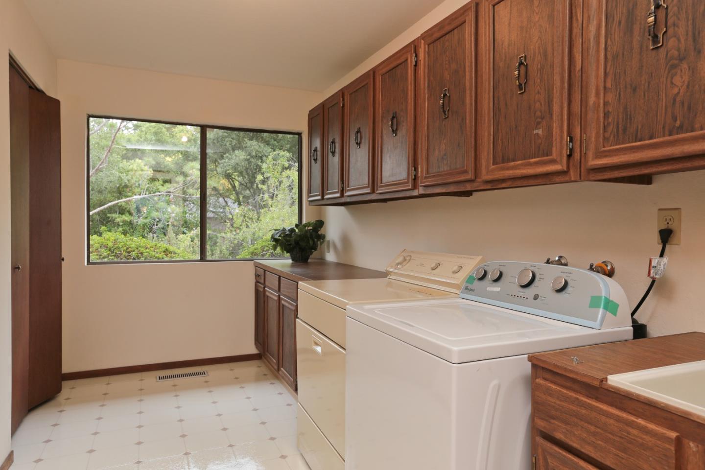 13987 Pike Road Saratoga, CA 95070 - Photo 16 of 28 a utility room with dryer and washer