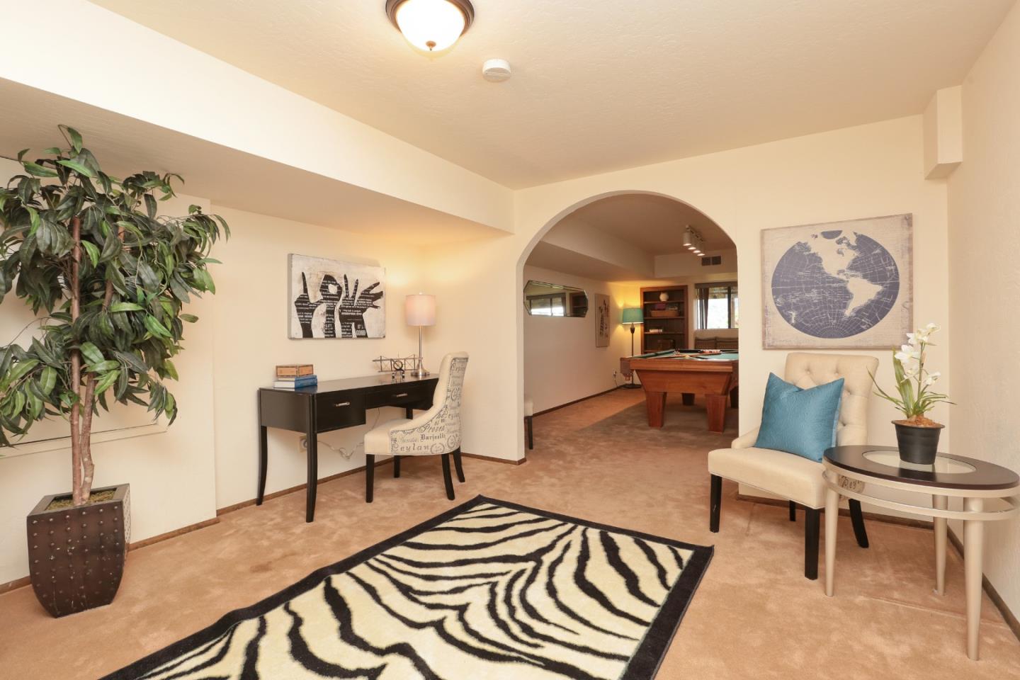 13987 Pike Road Saratoga, CA 95070 - Photo 17 of 28 a living room with furniture and a potted plant