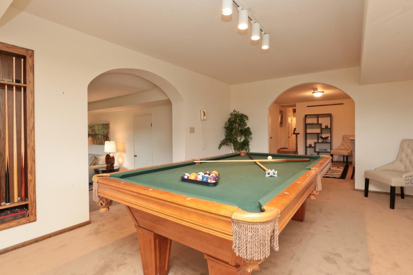 13987 Pike Road Saratoga, CA 95070 - Photo 18 of 28 a view of a pool table and chairs in living room