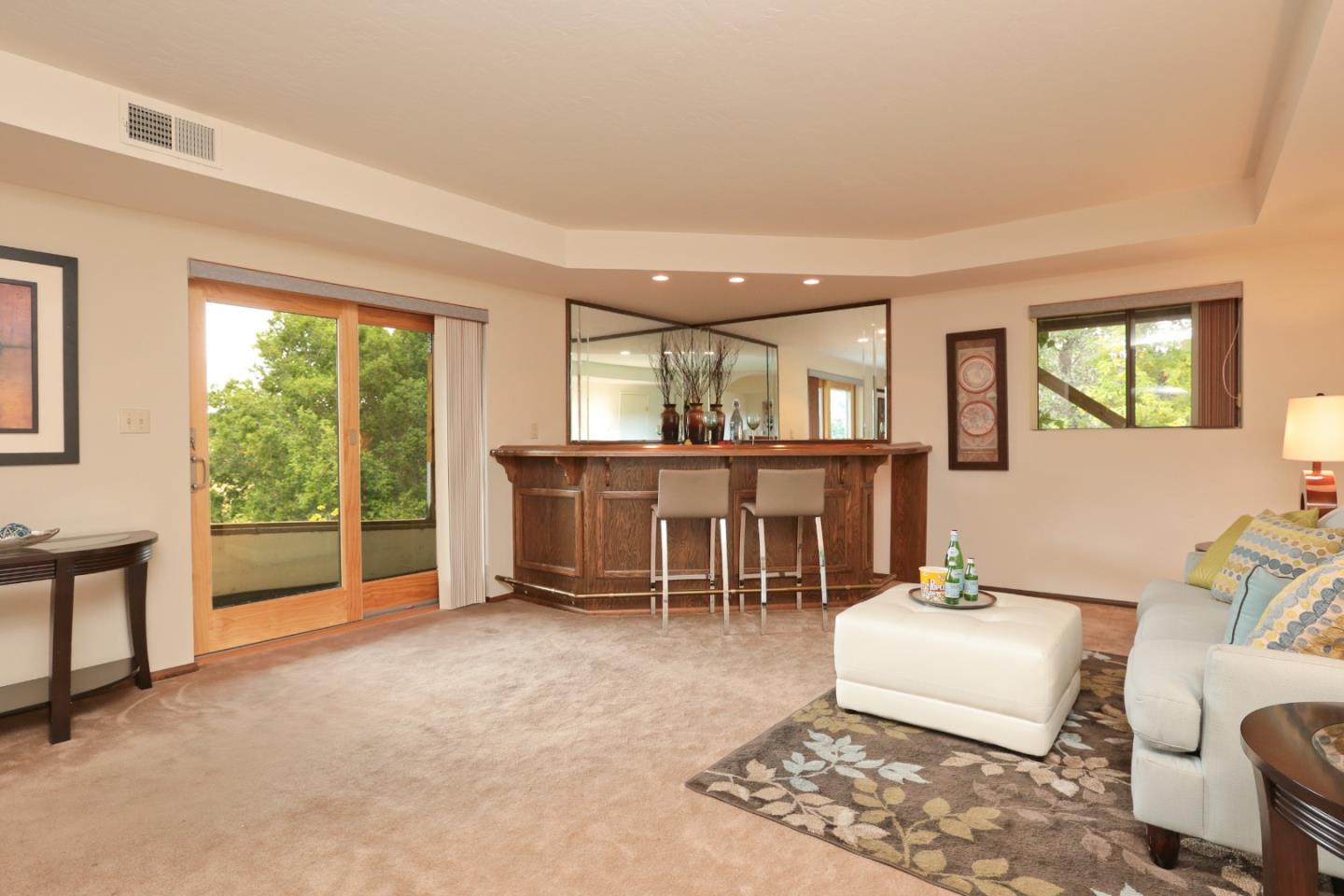 13987 Pike Road Saratoga, CA 95070 - Photo 20 of 28 a living room with furniture and a large window