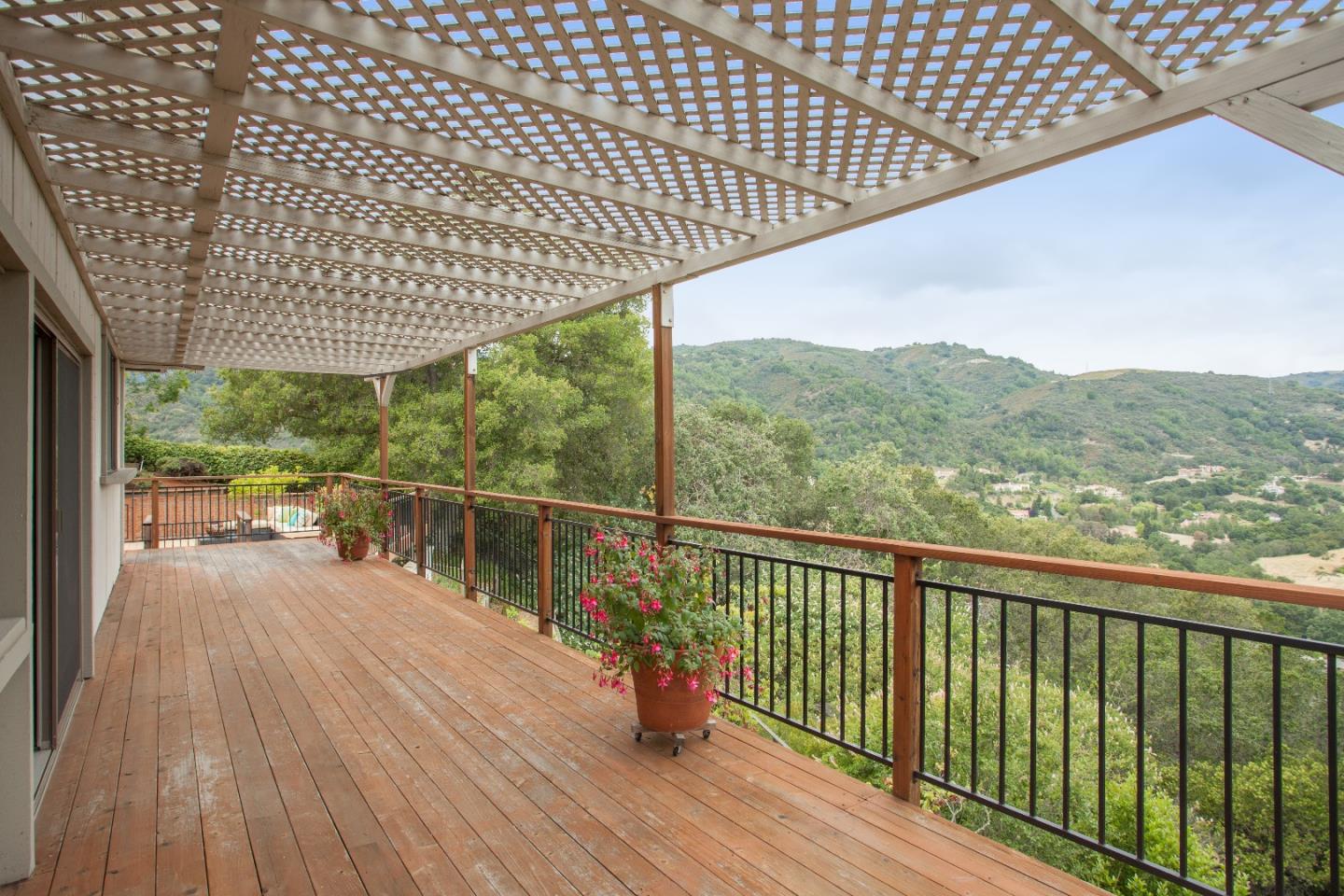 13987 Pike Road Saratoga, CA 95070 - Photo 21 of 28 a balcony with trees in front of it
