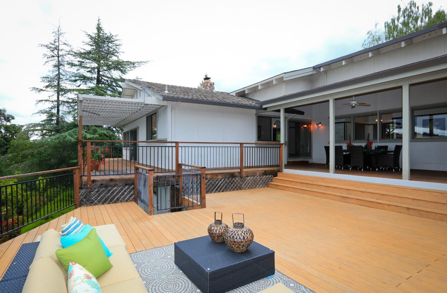 13987 Pike Road Saratoga, CA 95070 - Photo 24 of 28 a view of a patio with couches chairs and a table
