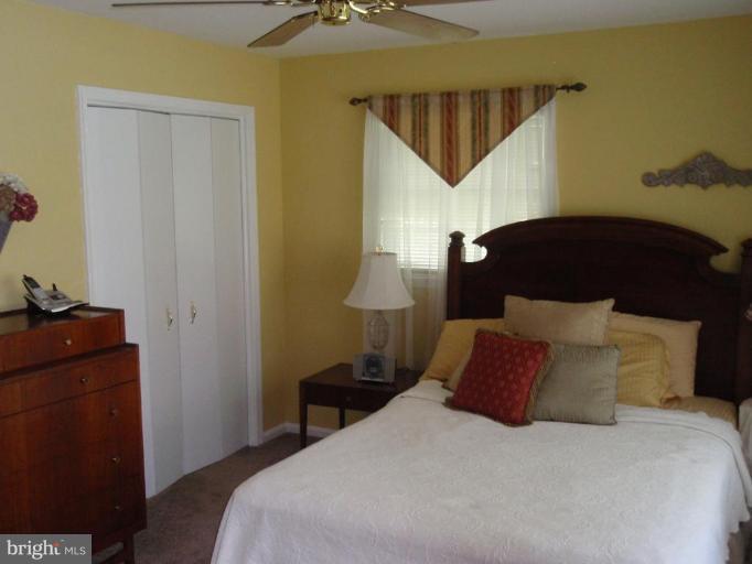 6721 Bulkley Road Lorton, VA 22079 - Photo 5 of 14 Light and bright master bedroom