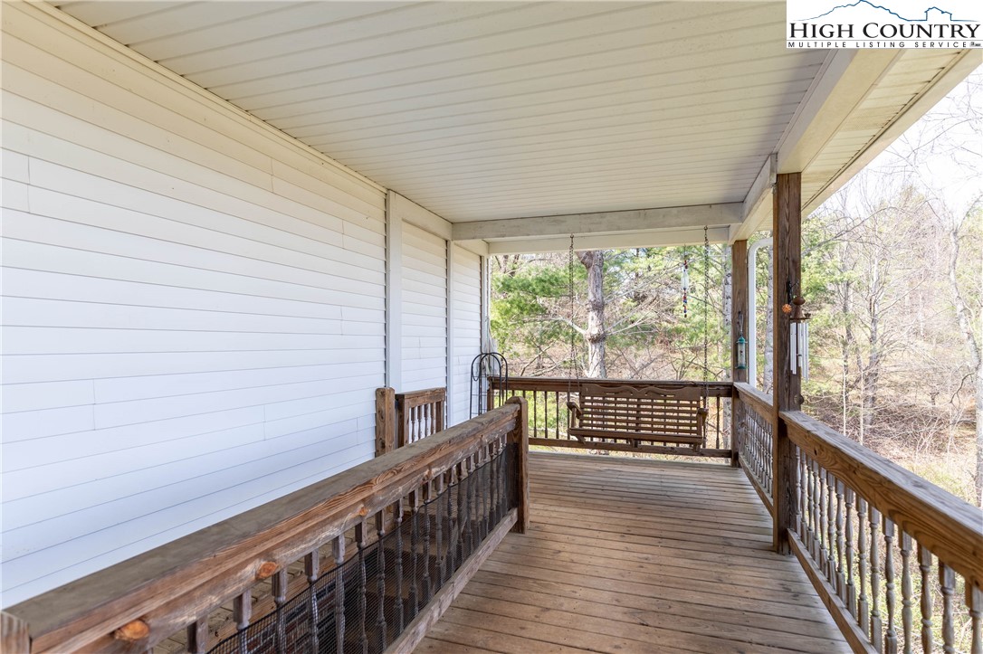 449 Meadow Ridge Drive Jefferson, NC 28640 - Photo 34 of 37 a view of balcony with wooden floor
